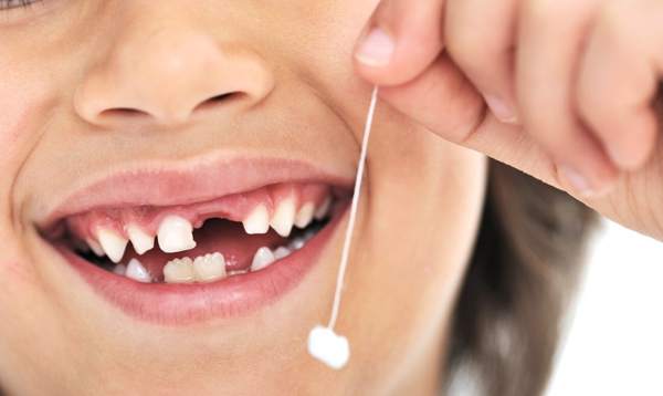 30b7d1bcacfe18d810572490fca7f73b Що робити з першим випало молочним зубом у дитини – прикмети розкажуть можна зберігати його і куди подіти