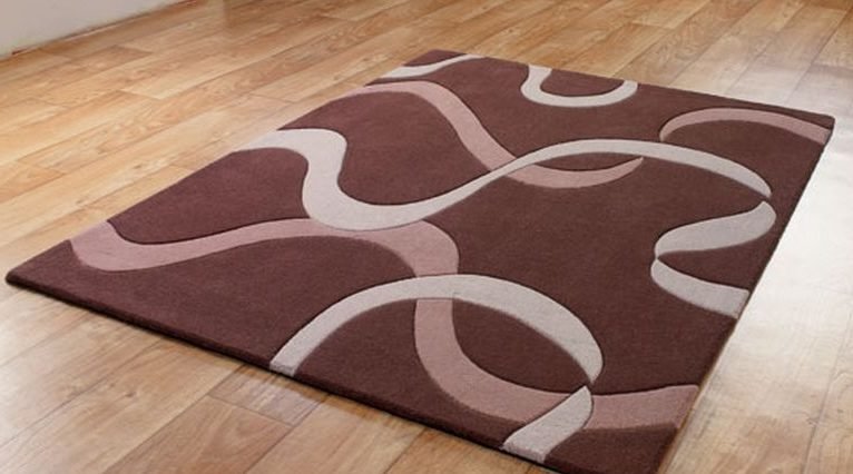 e8575fba7b432a7674fc4532ff102325 Килим на підлогу у вітальні: вибір матеріалу і красивого малюнка підлогового покриття для приміщення різного розміру