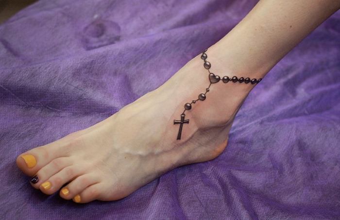 675646a17b18f0de52f3b6fe8558d5e9 Татуювання для дівчат на нозі. Фото красиві візерунки, маленькі написи, значення